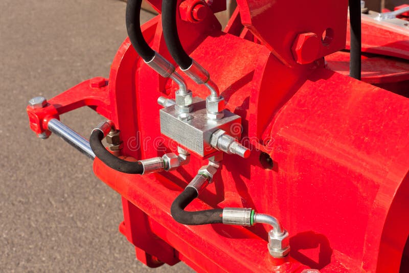 Hydraulicznego systemu węże elastyczni na Rolnej maszynie zdjęcia stock Hydraulicznego systemu węże elastyczni na Rolnej maszynie zdjęcia stock