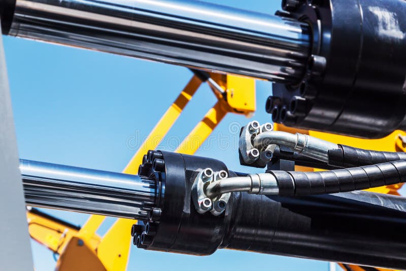 Hydrauliskt system av traktoren eller grävskopan Detaljer och delar royaltyfria foton Hydrauliskt system av traktoren eller grävskopan Detaljer och delar royaltyfria foton