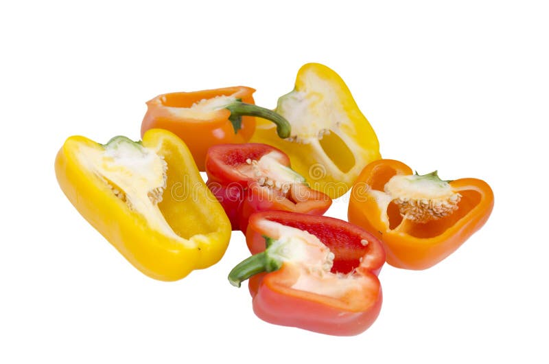 Hälften geschnittenen mehrfarbigen Gemüsepaprika stockbilder