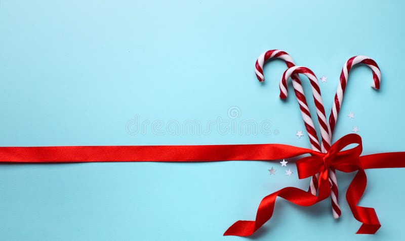 Hälsningskort för glad jul; Julgodisrotting royaltyfri bild Hälsningskort för glad jul; Julgodisrotting royaltyfri bild