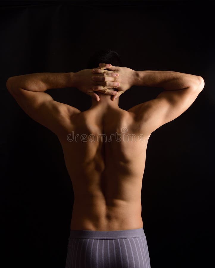 Hände kreuzten auf dem Nacken, Foto auf der Rückseite lizenzfreie stockfotografie Hände kreuzten auf dem Nacken, Foto auf der Rückseite lizenzfreie stockfotografie