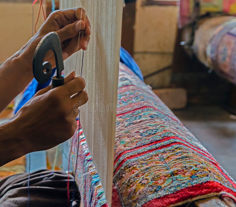 Händer som arbetar på en persisk matta, Srinagar, Jammu and Kashmir