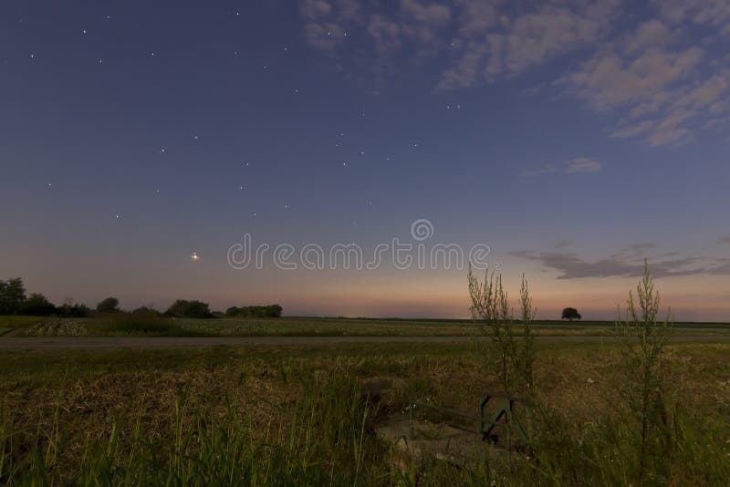 Beautiful dawn sky Jupiter and Venus Conjunction After sunset With Constellations Leo, Lynx, Ursa major, Leo minor, Cancer, Sextans, Virgo. Beautiful dawn sky Jupiter and Venus Conjunction After sunset With Constellations Leo, Lynx, Ursa major, Leo minor, Cancer, Sextans, Virgo