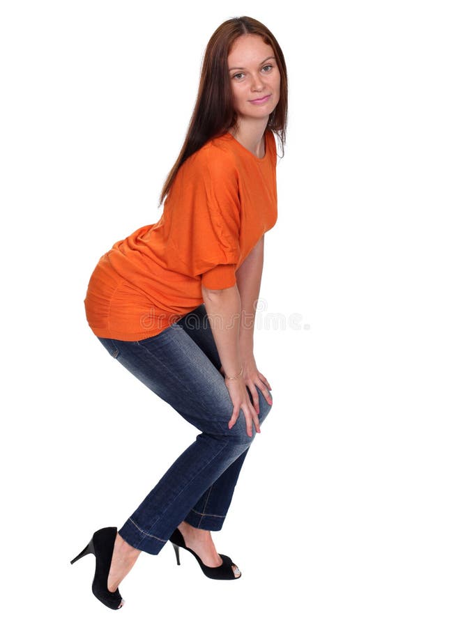 Download Härlig ung dam i jeans arkivfoto. Bild av orange, nätt - 37346256