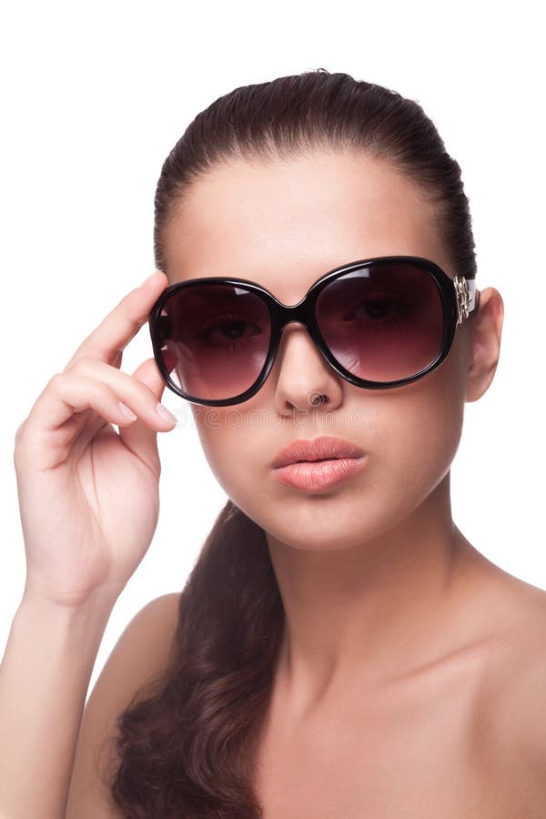 Portrait of beautiful young woman in big fashion sunglasses. Portrait of beautiful young woman in big fashion sunglasses