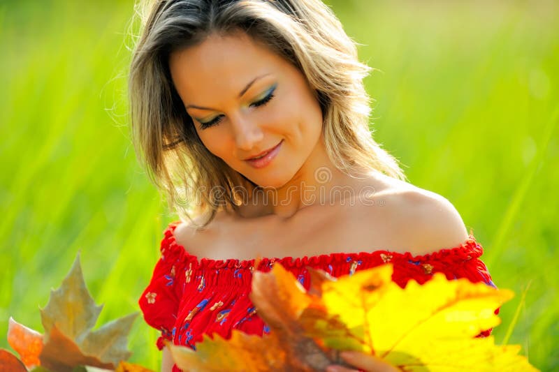 Beautiful young woman on field in summer. Beautiful young woman on field in summer