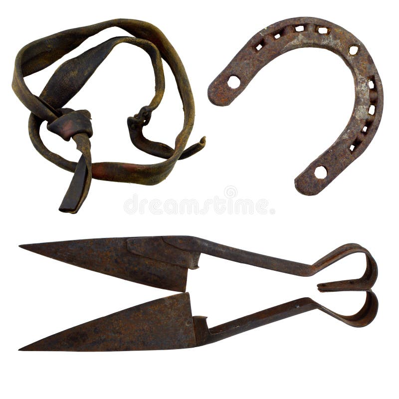 Isolated set of horseshoes, scissors for cutting hooves and old leather collar. Isolated set of horseshoes, scissors for cutting hooves and old leather collar