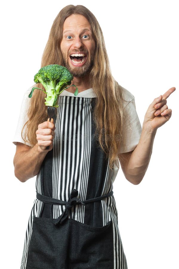 Hållande broccoli för rolig hippieman på en gaffel arkivfoton Hållande broccoli för rolig hippieman på en gaffel arkivfoton