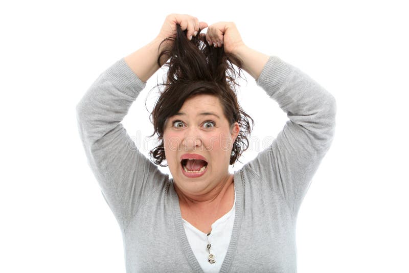 Woman tearing her hair out and screaming in anger and frustration isolated on white. Woman tearing her hair out and screaming in anger and frustration isolated on white