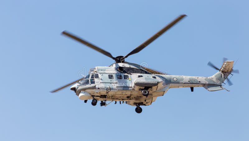 Hellenic Air Force (HAF) AS332C1 Super Puma helicopter in flight. Hellenic Air Force (HAF) AS332C1 Super Puma helicopter in flight.