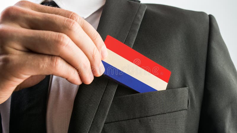 Hölzerne Karte gemalt als die niederländische Flagge stockbild