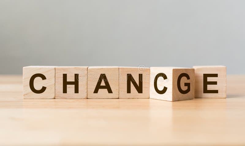 Wooden cube flip with word `change` to `chance` on wood table, Personal development and career growth or change yourself. Wooden cube flip with word `change` to `chance` on wood table, Personal development and career growth or change yourself