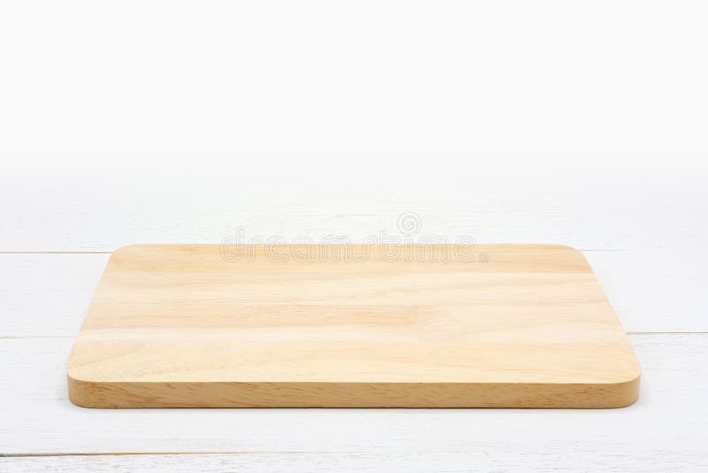 Hölzernes Schneidebrett des leeren Rechtecks auf weißem Holztisch