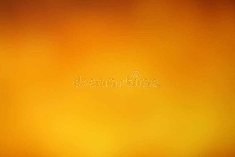 Höstguling och orange mjuk suddighet arkivbild
