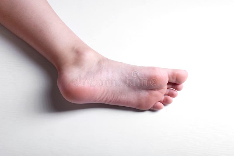 Hübsche Sohle, Füße und Fuß des jungen Mädchens stockfotos