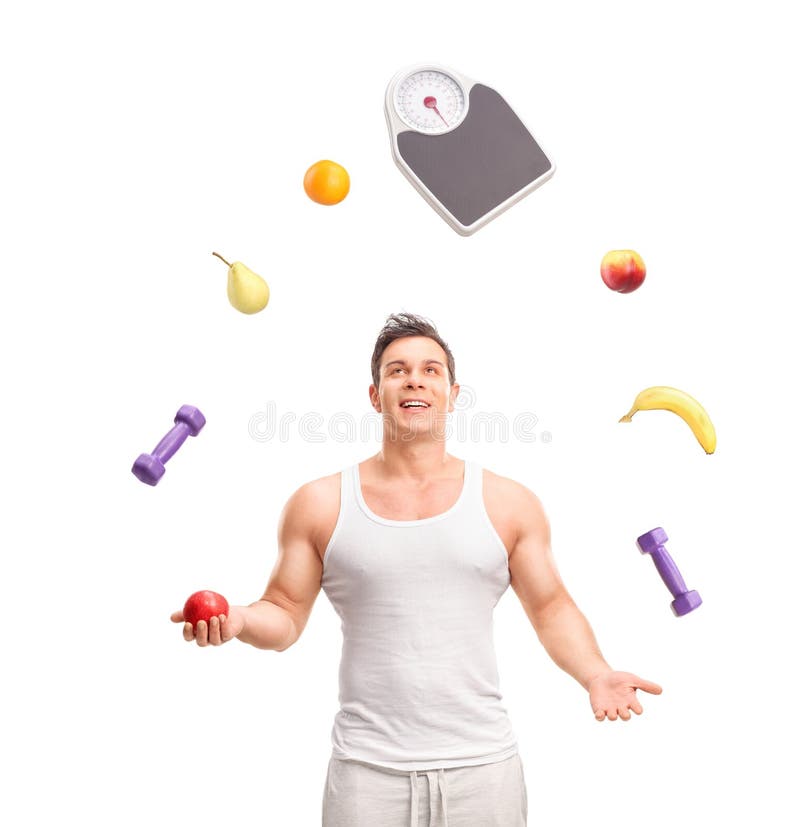 Hübscher Kerl, der mit Früchten jongliert stockfotos Hübscher Kerl, der mit Früchten jongliert stockfotos