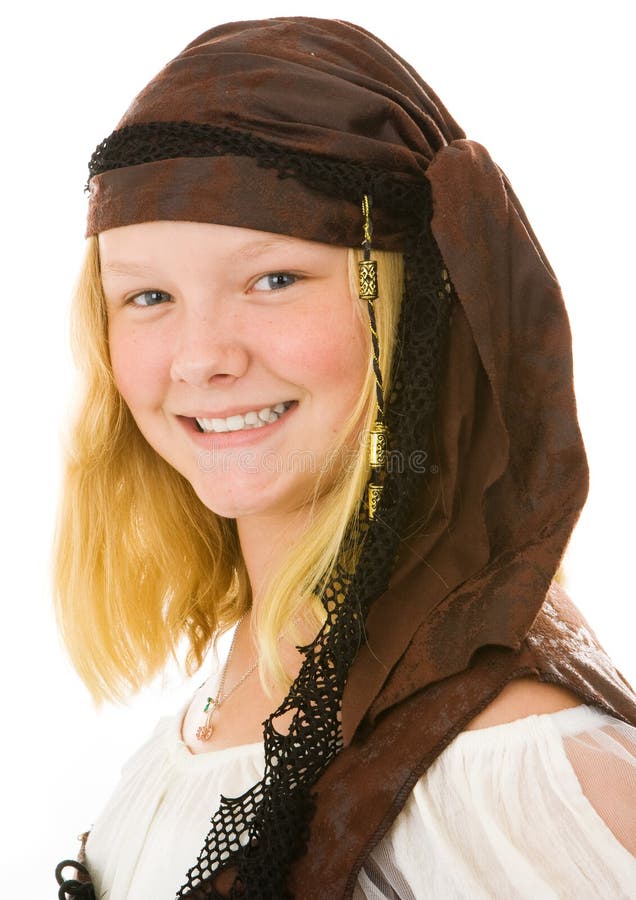 Portrait of a beautiful little girl dressed as a pirate for Halloween. Closeup on white background. Portrait of a beautiful little girl dressed as a pirate for Halloween. Closeup on white background.