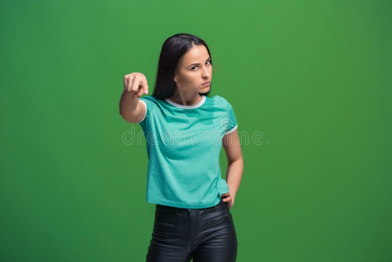 The overbearing business woman point you and want you, half length closeup portrait on green background. royalty free stock photo The overbearing business woman point you and want you, half length closeup portrait on green background. royalty free stock photo