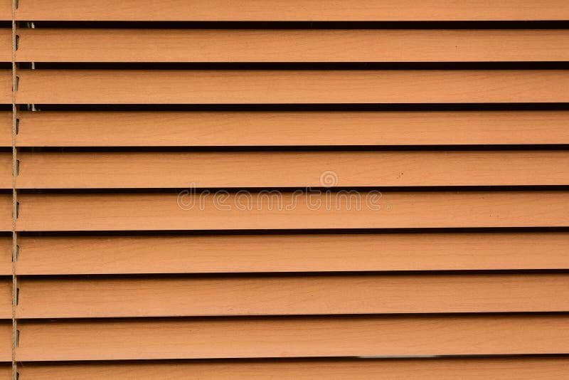 I ciechi orizzontali di Brown si chiudono fotografie stock libere da diritti I ciechi orizzontali di Brown si chiudono fotografie stock libere da diritti