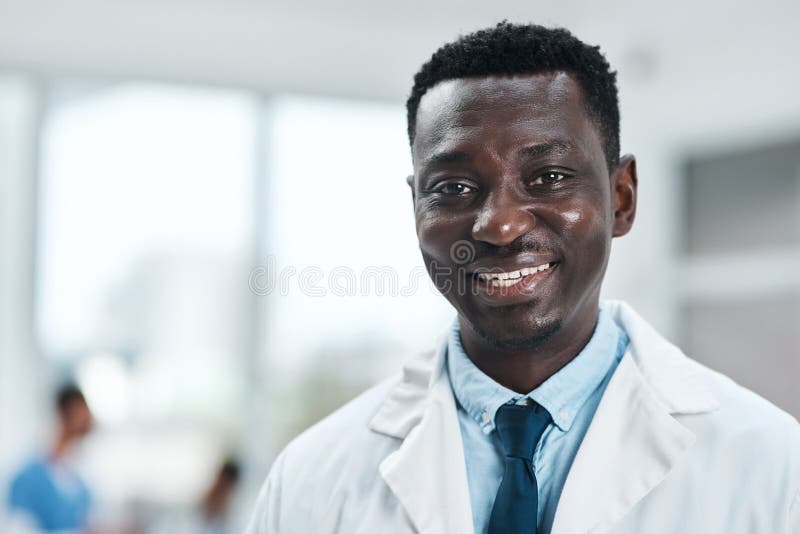 I dedicate my life to saving yours. Portrait of a mature doctor standing in a hospital. royalty free stock image