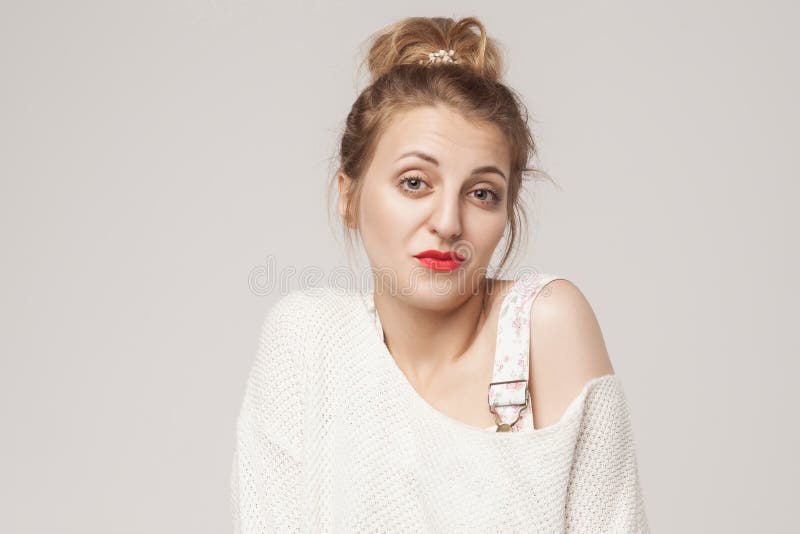 I don`t know! Disinterest blonde woman looking up. stock photos I don`t know! Disinterest blonde woman looking up. stock photos