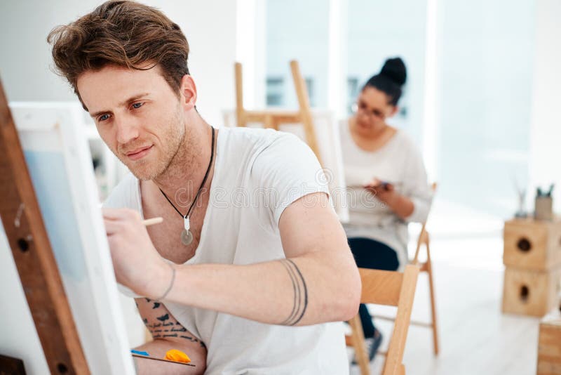 I Escape To a Different Reality through Art. a Handsome Young Artist