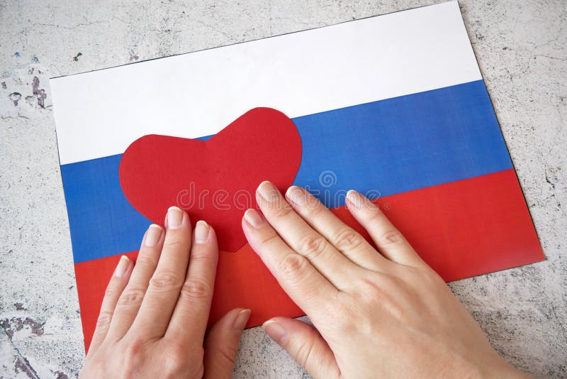 Russian flag in heart shape on white background stock photo