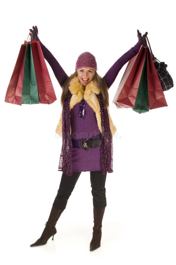 Happy, young woman with with upraised shopping bags. Looking at camera, front view. Isolated on white background. Happy, young woman with with upraised shopping bags. Looking at camera, front view. Isolated on white background.