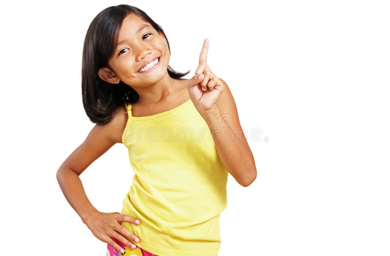 Happy asian girl showing her index finger. A success concept.focus is on the hand. Happy asian girl showing her index finger. A success concept.focus is on the hand.