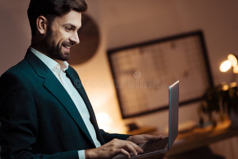 Profile photo of delighted man that typing message stock photography