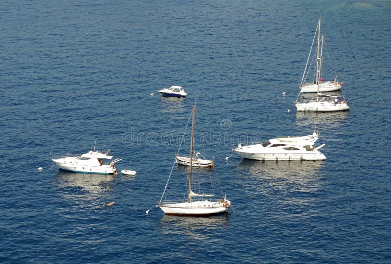 Yachts on Ligurian Sea (the Mediterranean), Italy. Yachts on Ligurian Sea (the Mediterranean), Italy.