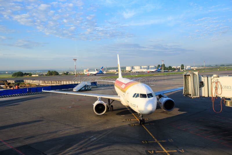 Iberia airlines aircraft prepares for boarding passengers through a telescopic ladder at the Domodedovo airport in Moscow stock photos Iberia airlines aircraft prepares for boarding passengers through a telescopic ladder at the Domodedovo airport in Moscow stock photos