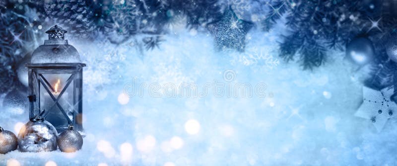 Christmas background with snow and a lantern