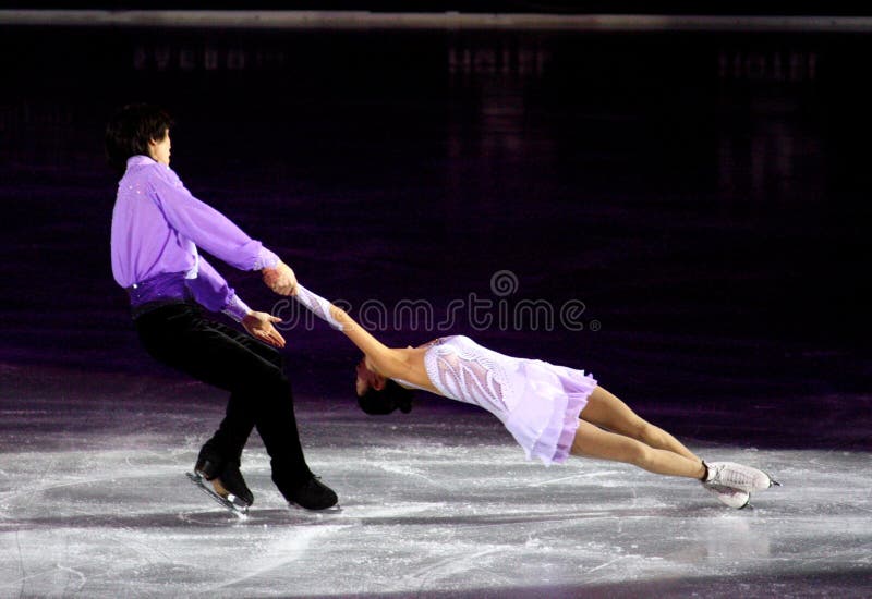 Event: Ice Christmas Gala 2010 Date and place: 18th December, 2010 â€“ Milan, Italy Famous ice skating champions performed accompanied by Christmas songs in the Assago Forum, Milan, Italy. In this photo: Qing Pang & Jian Tong. Event: Ice Christmas Gala 2010 Date and place: 18th December, 2010 â€“ Milan, Italy Famous ice skating champions performed accompanied by Christmas songs in the Assago Forum, Milan, Italy. In this photo: Qing Pang & Jian Tong