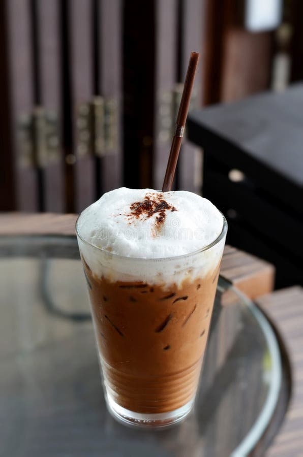 Hand Holding Iced Latte with Straw in Plastic Cup at Garden Blur Cafe  Restaurant in Hot Sunny Day.coffee Shop,cafe Leisure Stock Photo - Image of  delicious, restaurant: 156313504