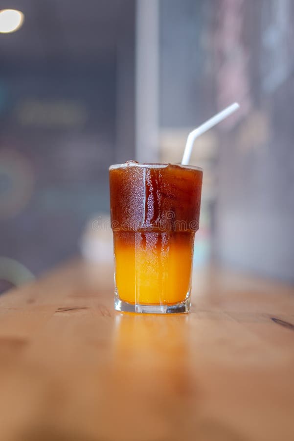 Ice Coffee, Americano Coffee with Orange in Cafe Stock Photo Image of