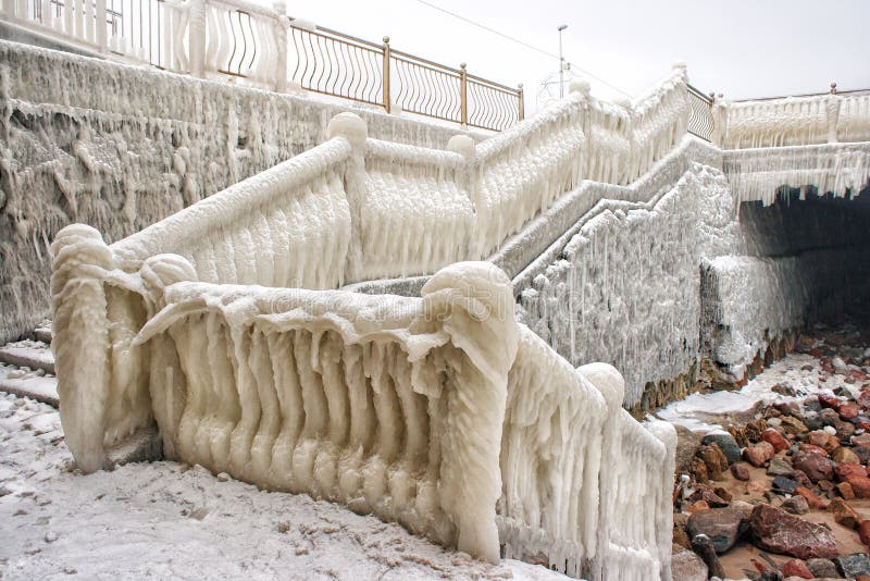 Ice covered staircase on the beach