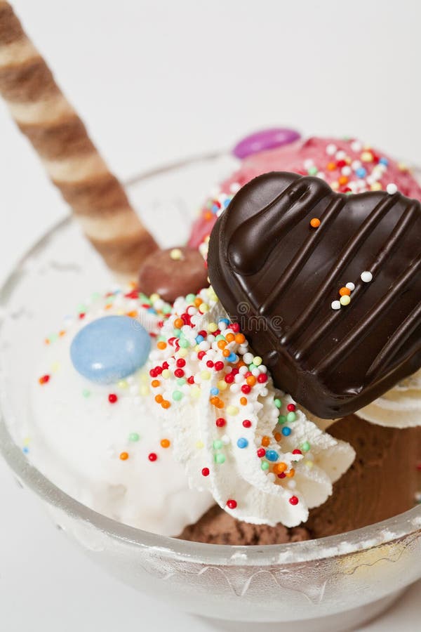 Ice cream cup with candy and cake