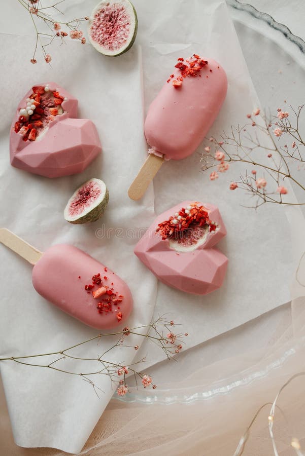 Ice Cream of Interesting Shape Pink Popsicle on a Stick Stock Image