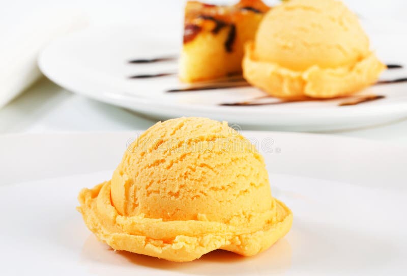 Ice cream and piece of sponge cake royalty free stock images Ice cream and piece of sponge cake royalty free stock images
