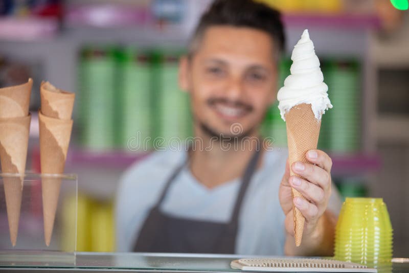 Ice Cream Seller Giving Ice Cream To Customer Stock Image Image of catering, happy 212232931