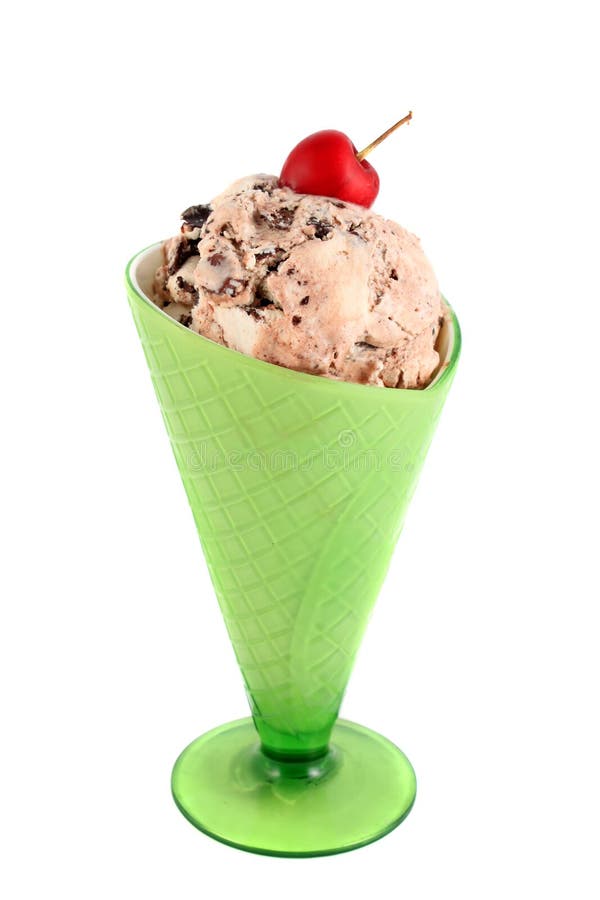 Vanilla ice cream with chocolate chunks in green sundae cup isolated on a white background. Vanilla ice cream with chocolate chunks in green sundae cup isolated on a white background