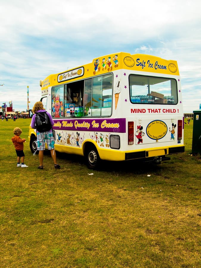 An Ice Cream Van with a Mother and Child Customers Editorial Photo