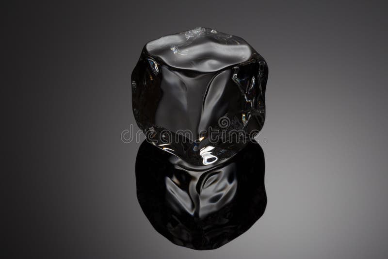 Ice cube with reflection royalty free stock photo