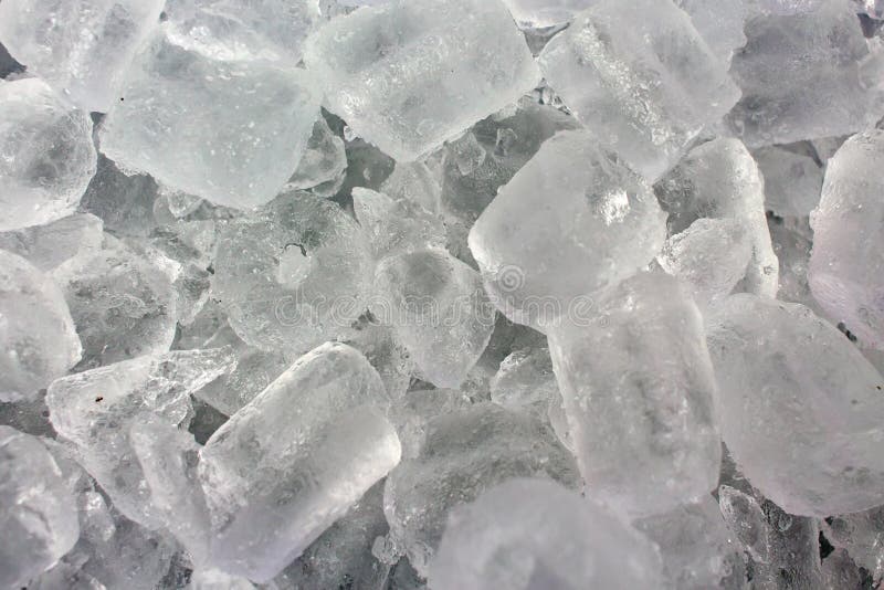 Ice cubes in a bucket of cold storage. royalty free stock photos