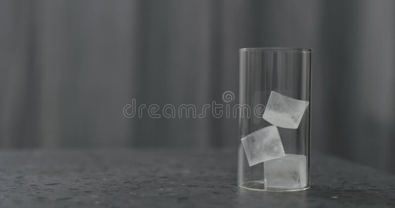 Ice Cubes In Glass To Make Iced Coffee On Terrazzo Countertop