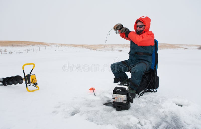 Ice fishing royalty free stock photography