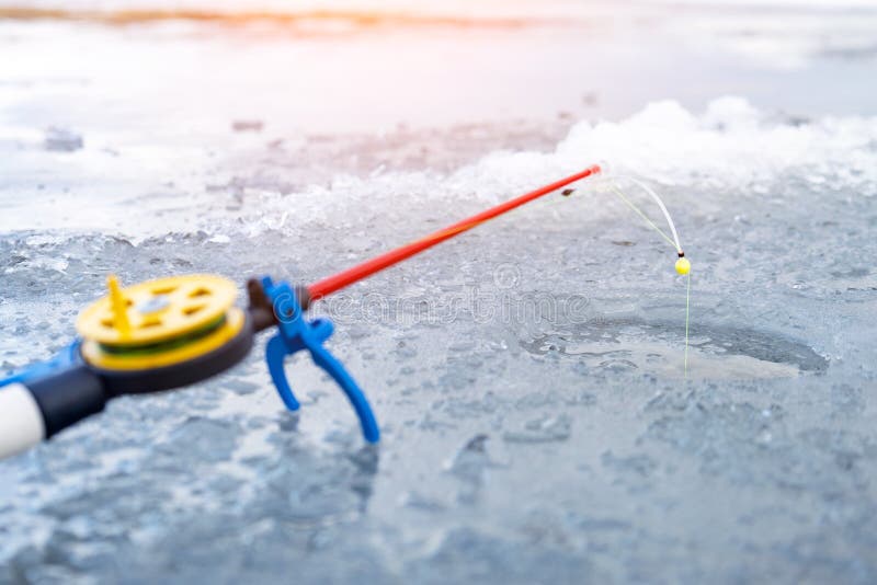 Ice Fishing Rod with the Lure by the Hole Stock Photo Image of