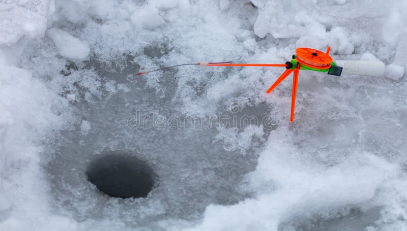 Ice fishing rod for winter fishing stock images