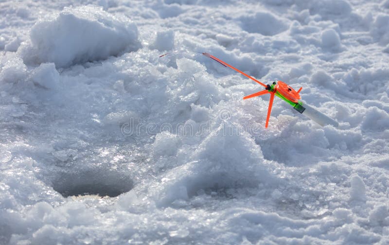 Ice fishing rod for winter fishing stock photos